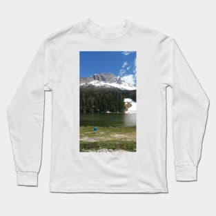 The fabulous alpine lake of Misurina in the Dolomites. Lovely and relaxing place in the Italian Alps. Chair on the shore. Reflections in the rippled water. Sunny spring day. Long Sleeve T-Shirt